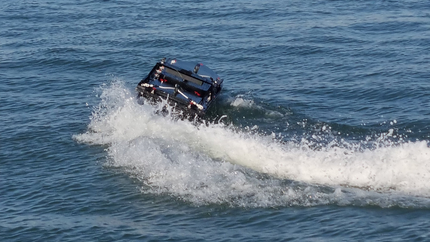 security and defense usv autonomous surface vessel, marine robotics, unmanned surface vessel, modular USV, hydrographic survey, water sampling, payload deployment.