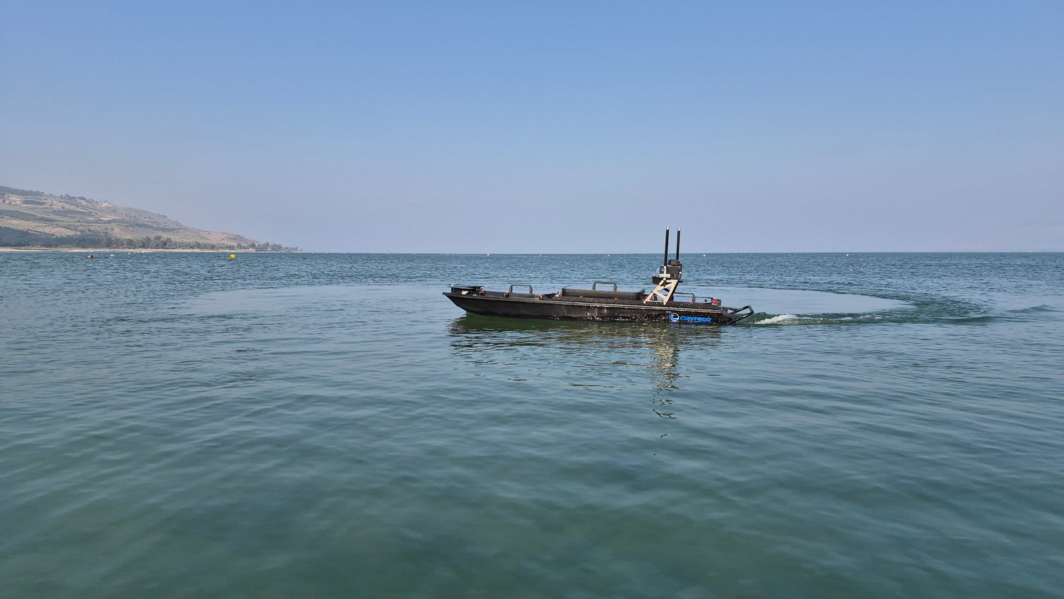 mono-hull USV, compact unmanned surface vessel, shallow-water USV, jet-powered USV, autonomous marine platform. Contego - viper 270 in water - usv for marine robotics