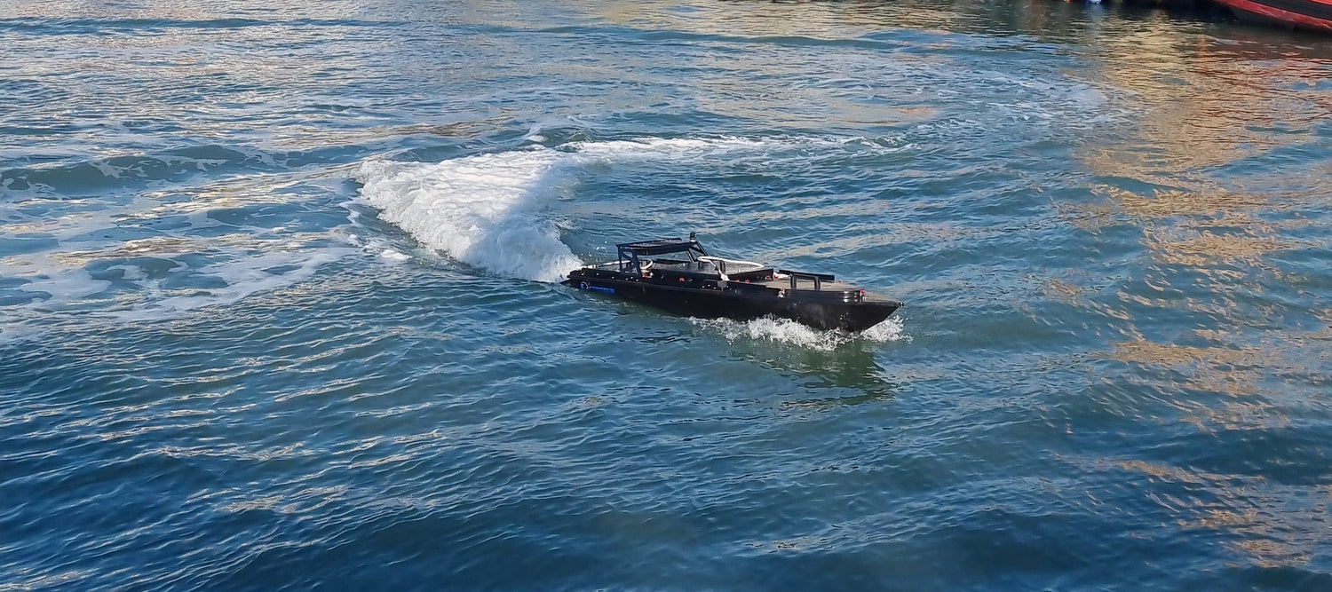 mono-hull USV, compact unmanned surface vessel, shallow-water USV, jet-powered USV, autonomous marine platform. Contego - viper 270 in water - usv for marine robotics